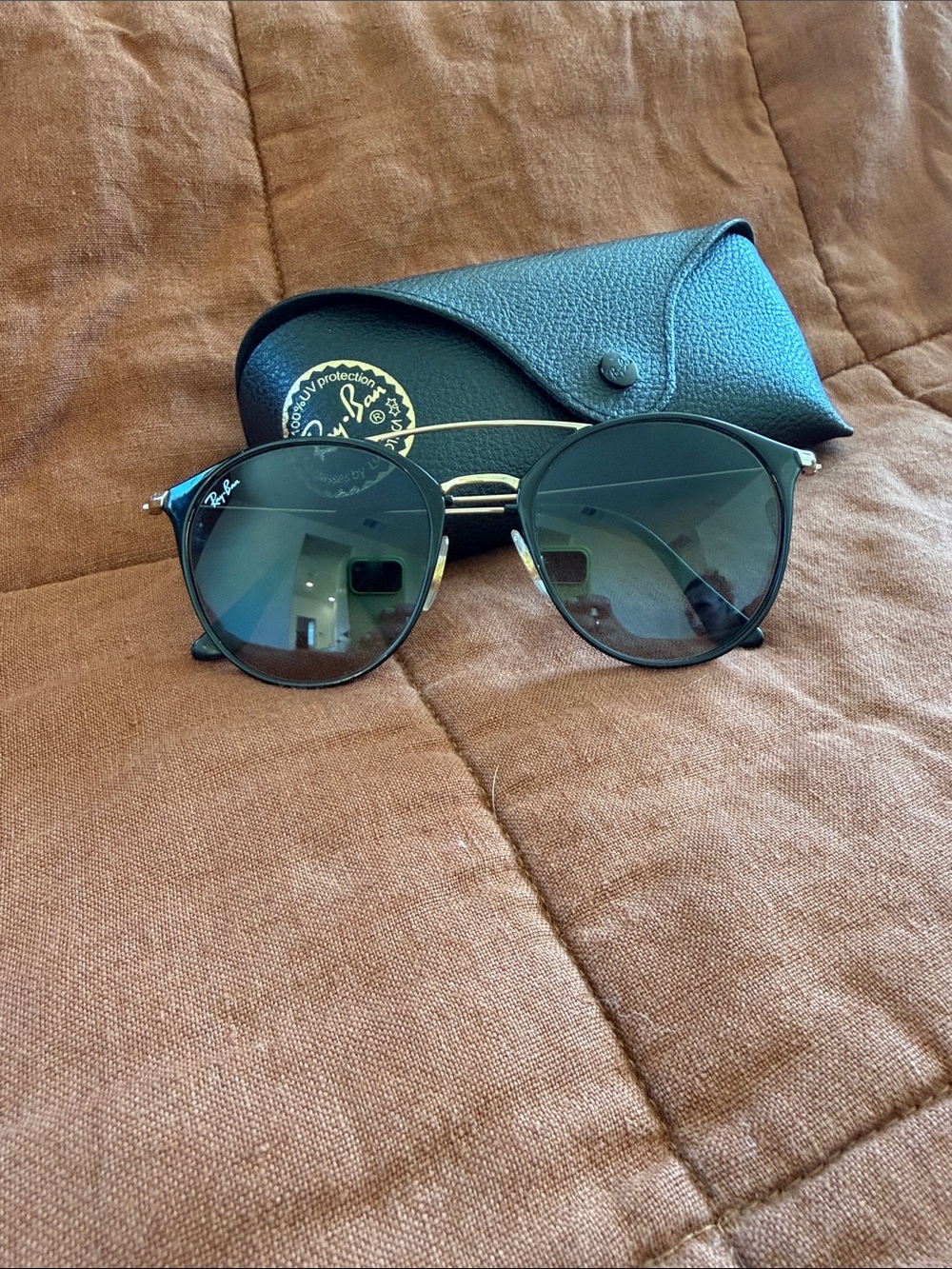Ray-Ban Black Round Metal Sunglasses with Gold Accent